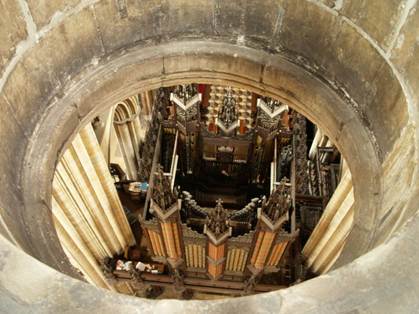 Looking down on the organ from the hole in the roof
